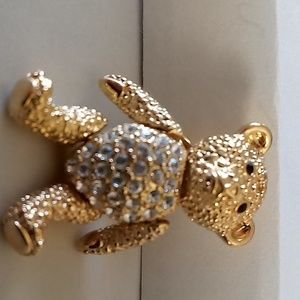 Cute gold bear pin with movable head, arms and legs.